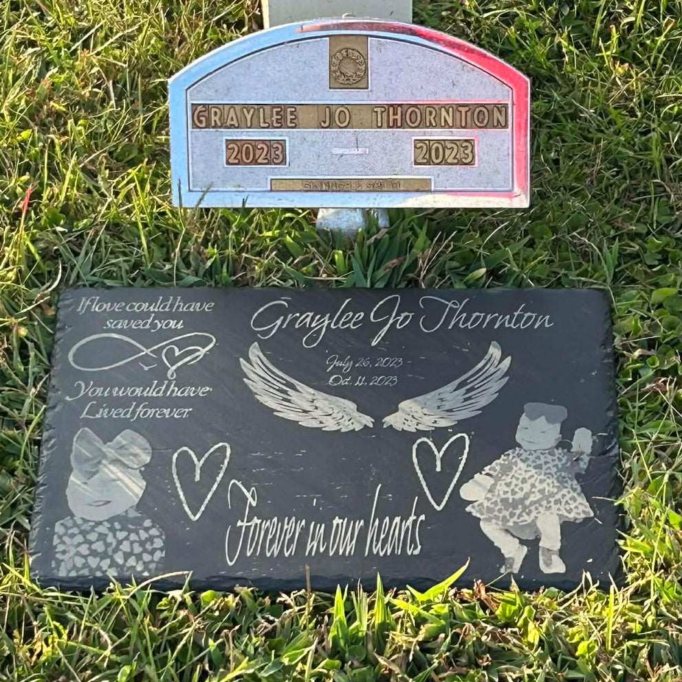A special laser engraved memorial photo slate for a customer who used it as their baby girls headstone.