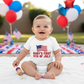 Baby wearing 4th of July onesie