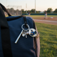 Baseball keychain on bag