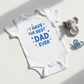 Best Dad Ever onesie laid out