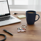 Papa keychain on desk