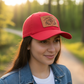 Red hat with patch being worn