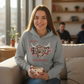 Square lifestyle photo of Valentine's hoodie