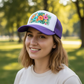Square lifestyle photo with designed trucker hat