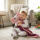 Toddler cuddling Ashla lovey