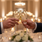Two grooms toasting with engraved champagne flutes